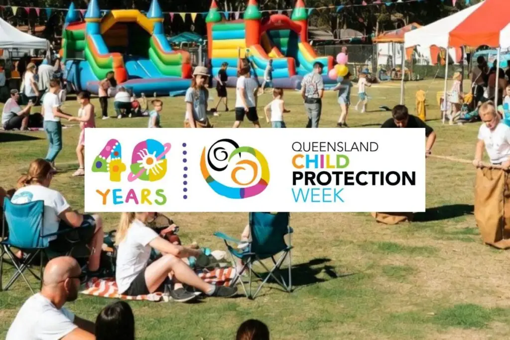Queensland Child Protection Week logo on background of families at at an outdoor event.